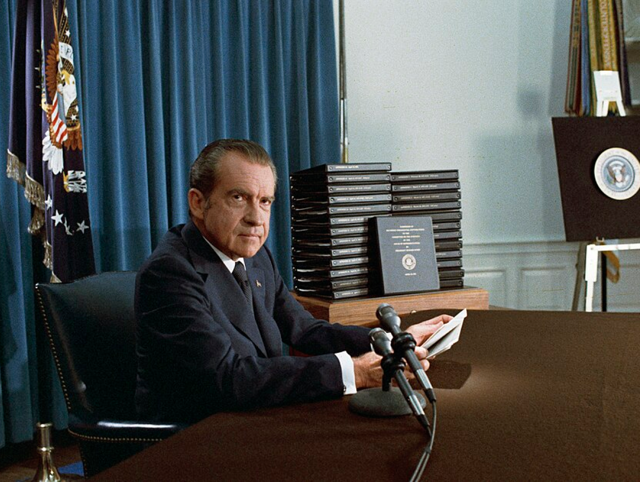 President Nixon, with edited transcripts of Nixon White House Tape conversations during broadcast of his address to the Nation.