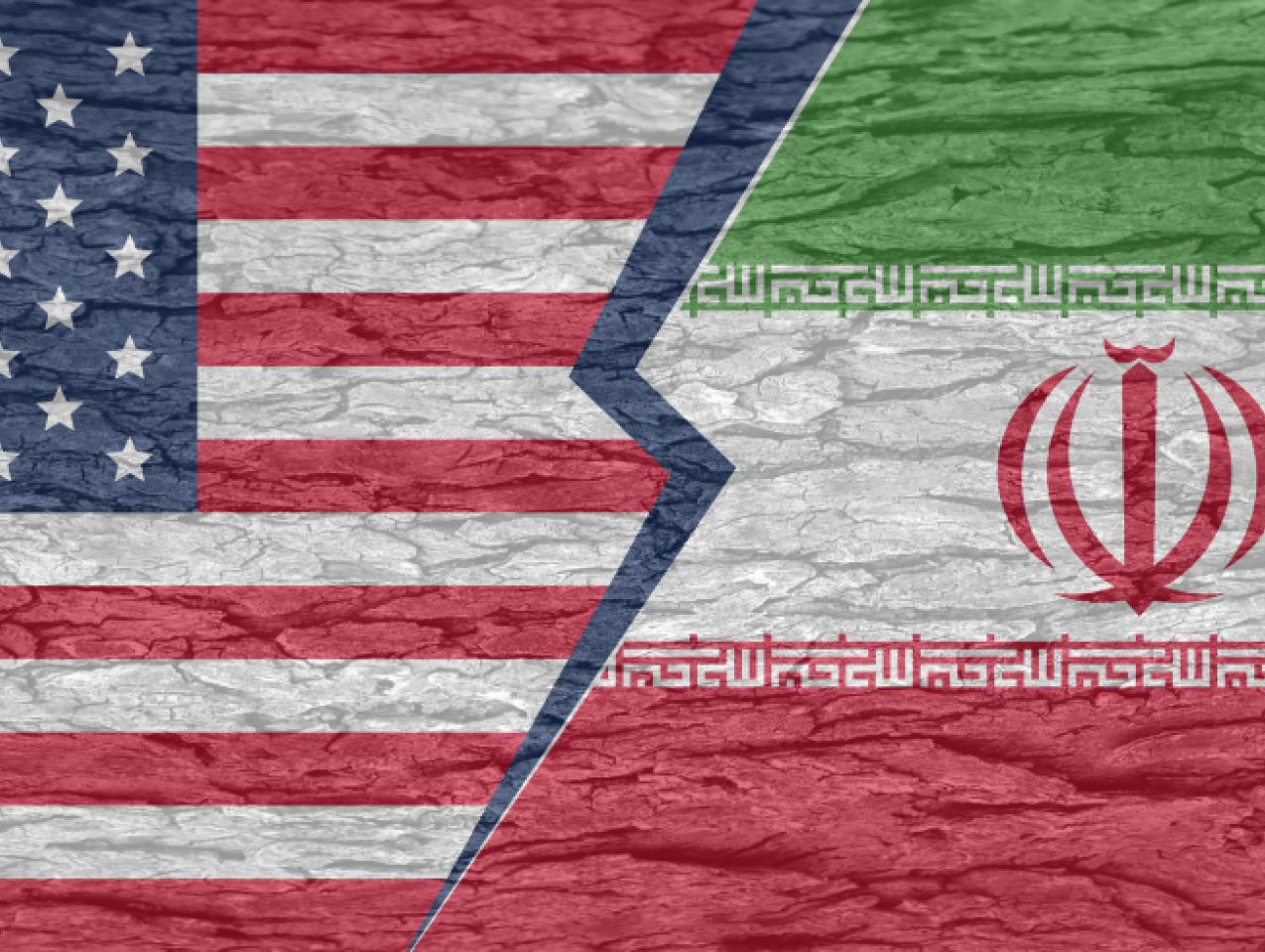 Severed ground separating the countries of america and iran on a cracked surface - stock illustration