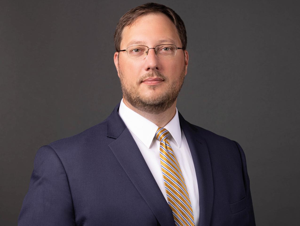Adam J. White