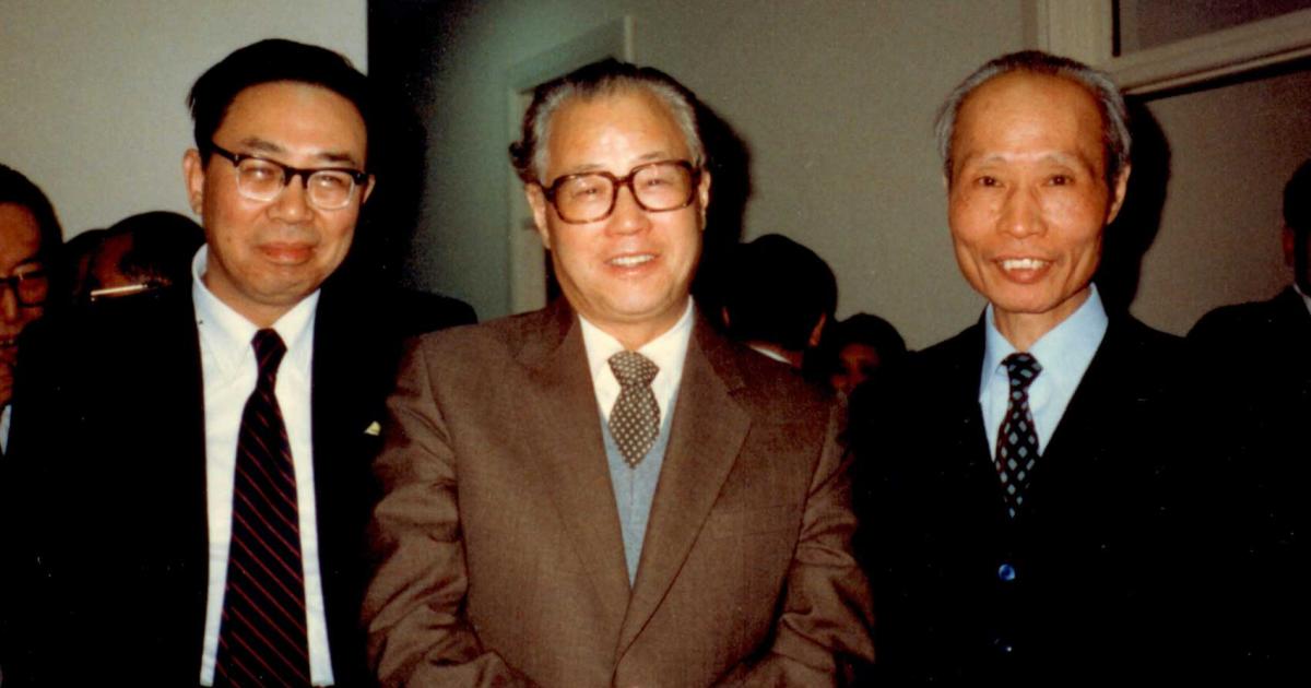 Three men in suits. Li Shenzhi (left) and China’s premier Zhao Ziyang (middle)