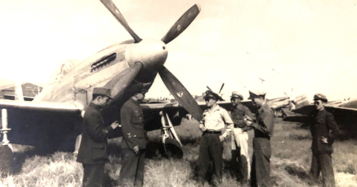 Cheng Sung-ting (second from right) and other military leaders inspect a P-51 fighter plane in Nanking shortly after the seat of the Nationalist government relocated to the city, ca. 1946. 