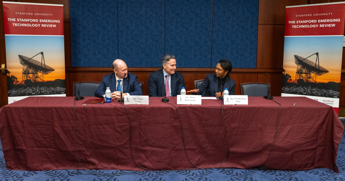 Director Rice, Senators Coons, and McCormick in conversation during their panel session.