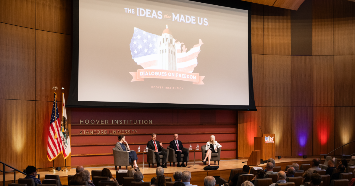 (From left to right) Washington Post columnist Megan McArdle and senior fellows John Cochrane, Ross Levine and Valerie Ramey speak about America’s future economic prospects in Hauck Auditorium on May 12, 2026. (Patrick Beaudouin)
