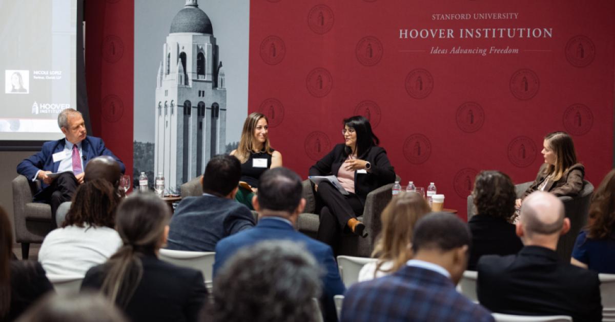 Senior Fellow Eugene Volokh (right), Katie Visser of Cloudflare, Ellie Sakahee of Google and Nicole Lopez of Orrick LLP are seen in Hoover’s Stauffer Auditorium on July 21, 2026.