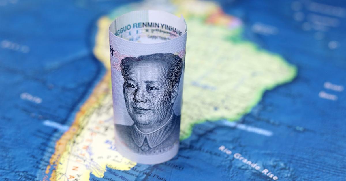 Chinese yuan on the map of South America - stock photo