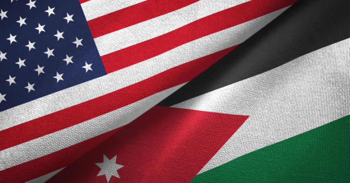 Jordan and United States two flags together textile cloth, fabric texture - stock photo