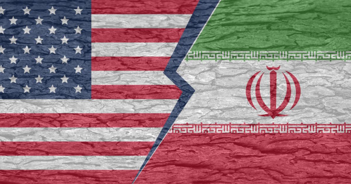 Severed ground separating the countries of america and iran on a cracked surface - stock illustration