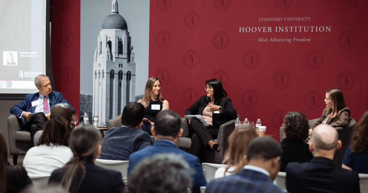 Senior Fellow Eugene Volokh (right), Katie Visser of Cloudflare, Ellie Sakahee of Google and Nicole Lopez of Orrick LLP are seen in Hoover’s Stauffer Auditorium on July 21, 2026.