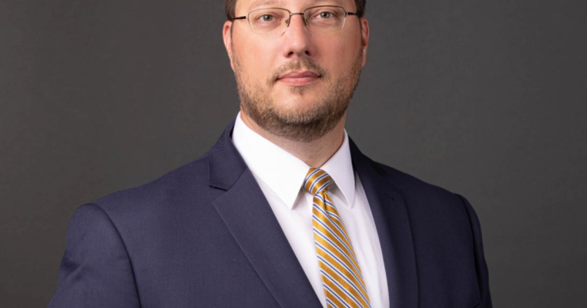 Adam J. White
