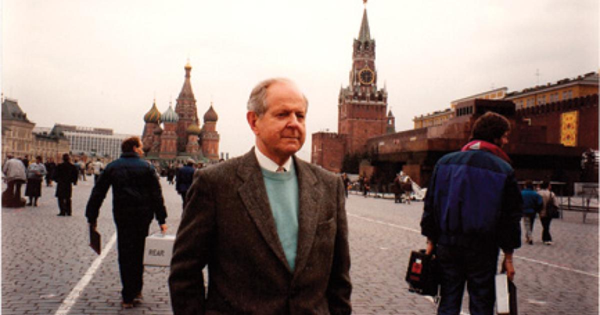 Robert Conquest and a television crew prepare for a scene in the documentary Red Empire